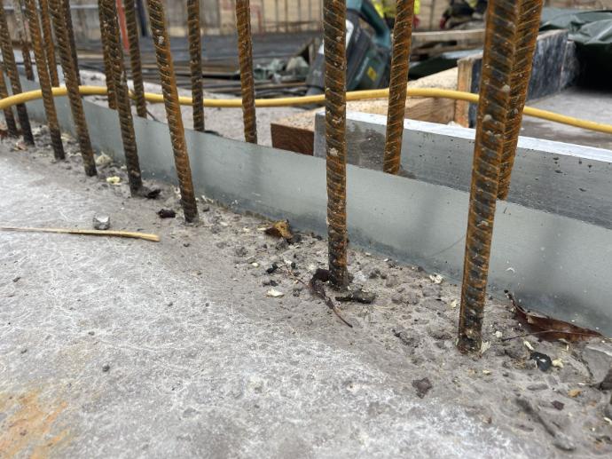 polymer coated WPM metal sheet waterstop after concrete cast