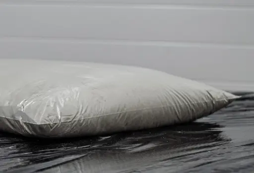 Crystalline admixture is packaged into a soluble bag Crystalline admixture is packaged into a soluble bag