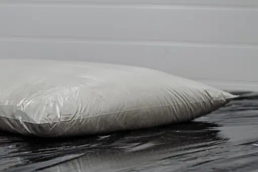 Crystalline admixture in soluble bags to the concrete mix. Crystalline admixture in soluble bags to the concrete mix.